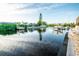 Calm canal with docked boats and waterfront homes at 6530 Senegal Palm Way, Apollo Beach, FL 33572