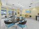 Modern clubhouse lounge area with comfortable seating, stylish decor, and a welcoming atmosphere for residents at 9132 Bernini Pl, Sarasota, FL 34240