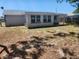 Large backyard area offering outdoor space and a lush green setting at 11608 Zimmerman Rd, Port Richey, FL 34668