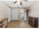 Bedroom with double doors, wood floors, and built-in shelving at 1742 31St S St, St Petersburg, FL 33712