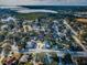 Aerial view of a residential area near a waterfront at 1922 Sheffield Ct, Oldsmar, FL 34677