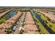 Aerial view of community with canal and homes at 309 Mystic Falls Dr, Apollo Beach, FL 33572