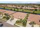 Aerial view of home with driveway and landscaping at 309 Mystic Falls Dr, Apollo Beach, FL 33572