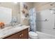 Bathroom boasts granite vanity and a shower/tub combo at 309 Mystic Falls Dr, Apollo Beach, FL 33572