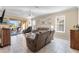 Living area with comfortable seating and access to the outdoors at 309 Mystic Falls Dr, Apollo Beach, FL 33572