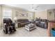 Bright and airy living room with comfortable seating at 309 Mystic Falls Dr, Apollo Beach, FL 33572