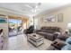 Living room with sliding doors leading to the patio at 309 Mystic Falls Dr, Apollo Beach, FL 33572