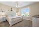 Bright main bedroom with a king-size bed and plenty of natural light at 309 Mystic Falls Dr, Apollo Beach, FL 33572