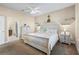 Spacious main bedroom with king-size bed and ensuite bathroom access at 309 Mystic Falls Dr, Apollo Beach, FL 33572