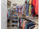 Large walk-in closet with ample shelving and hanging space at 309 Mystic Falls Dr, Apollo Beach, FL 33572