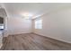 Dining area with hardwood floors and large window with blinds at 35131 Deerfield Oaks Dr, Zephyrhills, FL 33541