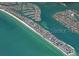 Aerial view of coastline with buildings at 400 64Th Ave # 908, St Pete Beach, FL 33706