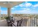 Relaxing balcony featuring lounge chairs with beautiful city and water views at 400 64Th Ave # 908, St Pete Beach, FL 33706