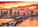 Sunset view of the cityscape from over the water at 400 64Th Ave # 908, St Pete Beach, FL 33706