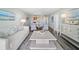 A bright living space with luxury furniture, wood floors, and decorative interior design at 400 64Th Ave # 908, St Pete Beach, FL 33706