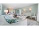 Open floor plan living space featuring luxury furniture, wood floors, and decorative design at 400 64Th Ave # 908, St Pete Beach, FL 33706