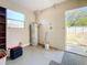 Laundry area with water heater and exterior access at 516 64Th S St, St Petersburg, FL 33707