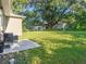 Large backyard with patio and lush lawn at 6904 E 18Th Ave, Tampa, FL 33619