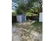 Backyard with shed and partially paved area at 8218 N 18Th St, Tampa, FL 33604