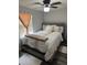 Bright bedroom with a comfortable bed and neutral decor at 8218 N 18Th St, Tampa, FL 33604