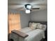 Cozy bedroom with comfortable bed and neutral decor at 8218 N 18Th St, Tampa, FL 33604