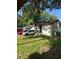 Cozy home situated on a large lot with a grassy yard at 8218 N 18Th St, Tampa, FL 33604