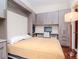 Guest bedroom with a built-in murphy bed and lots of storage at 111 N 12Th St # 1708, Tampa, FL 33602