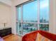 Bright bedroom with floor to ceiling windows showcasing stunning city views at 111 N 12Th St # 1708, Tampa, FL 33602