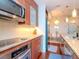 Modern kitchen with stainless steel appliances and granite countertops at 111 N 12Th St # 1708, Tampa, FL 33602