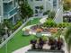Landscaped courtyard with lush greenery and walking paths at 111 N 12Th St # 1708, Tampa, FL 33602