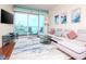 Spacious living room with comfortable sectional sofa and water view at 111 N 12Th St # 1708, Tampa, FL 33602