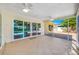 Bright screened porch overlooking the pool at 12136 Kay Dr, Seminole, FL 33772