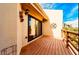 Balcony view with wood flooring, sliding glass doors, and decorative flower pots at 1710 Lighthouse S Ter # 1, South Pasadena, FL 33707