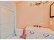 A bathroom with a shower, toilet, vanity, and mirrored medicine cabinet at 1710 Lighthouse S Ter # 1, South Pasadena, FL 33707
