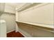 A well-organized walk-in closet with ample shelving and storage space at 1710 Lighthouse S Ter # 1, South Pasadena, FL 33707