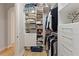 Well-organized walk-in closet with custom shelving at 18017 Pine Hammock Blvd, Lutz, FL 33548