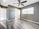 Bright bedroom with ceiling fan and vinyl flooring at 2152 74Th N St, St Petersburg, FL 33710