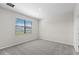 Neutral bedroom with a window and carpeted floors at 2748 Winding Creek Trl, North Port, FL 34289