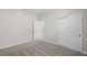 Bedroom with carpet flooring, closet for storage, and an open doorway to another room at 2748 Winding Creek Trl, North Port, FL 34289