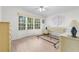Spacious bedroom with large windows and wood flooring at 34124 Estates Ln, Wesley Chapel, FL 33543