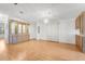 Large dining area with hardwood floors and built-in hutch at 34124 Estates Ln, Wesley Chapel, FL 33543