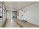 Enclosed porch with tiled floor and access to exterior at 34124 Estates Ln, Wesley Chapel, FL 33543