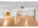 Spacious living area with hardwood floors and built-in hutch at 34124 Estates Ln, Wesley Chapel, FL 33543