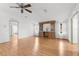 Bright living room with hardwood floors and ceiling fan at 34124 Estates Ln, Wesley Chapel, FL 33543