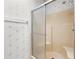 Updated shower with sliding glass doors at 34124 Estates Ln, Wesley Chapel, FL 33543