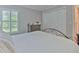 Spacious bedroom with a queen bed and large closet at 3922 Cedar Cay Cir, Valrico, FL 33596