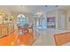 Spacious dining area with hardwood floors and a chandelier at 3922 Cedar Cay Cir, Valrico, FL 33596