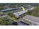 Aerial view of condo building with surrounding landscape at 4001 58Th N St # 20, Kenneth City, FL 33709