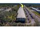 Condo building aerial view, highlighting its location and parking at 4001 58Th N St # 20, Kenneth City, FL 33709