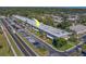 Aerial view showcasing condo building and parking spaces at 4001 58Th N St # 20, Kenneth City, FL 33709